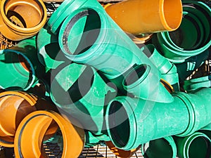 Pieces of plastic pipe in a mesh box