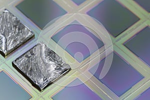 Pieces of polycrystalline silicon integrated on a polysilicon substrate with microchips