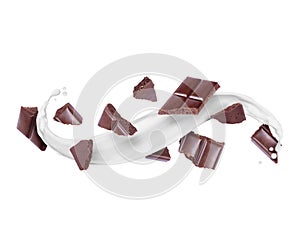 Pieces of porous chocolate bar with milk splashes