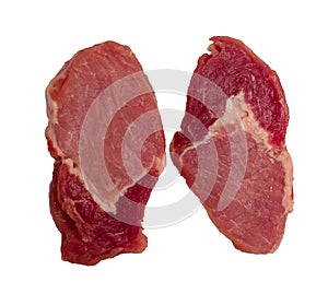 Pieces of raw pork chop isolated on white background