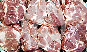 Pieces of raw pork meat for sale