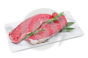 Pieces of raw roast beef meat