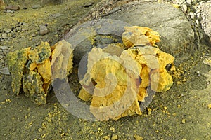 Pieces of raw Sulfur after mining from Kawah Ijen, a volcano in East Java, Indonesia. Sulphur is important to used in