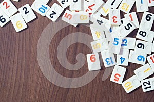 Pieces of rummy placed in order on the table