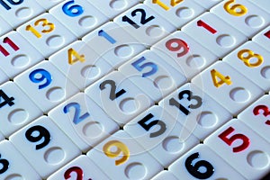 Pieces of rummy placed in order on the table