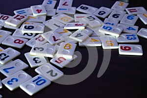 Pieces of rummy placed in order on the table