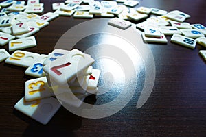 Pieces of rummy placed in order on the table