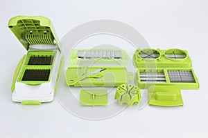 Pieces and set of stainless steel green color precision modern cutting food slicer or dicer for fruit, cheese, sausage vegetables