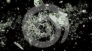 Pieces of splitted or broken glass on black