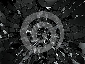 Pieces of splitted or cracked glass on black