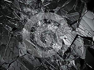 Pieces of splitted or cracked glass on black