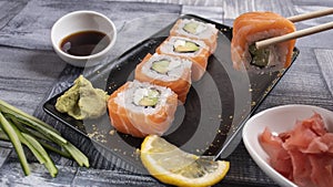 4 pieces of sushi for torrets and decoration, one piece is taken photo