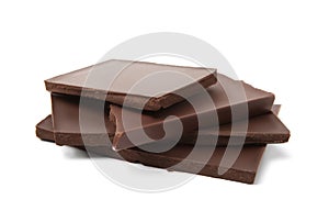 Pieces of tasty dark chocolate bar on isolated white