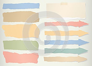 Pieces of torn colorful blank paper, arrow symbol