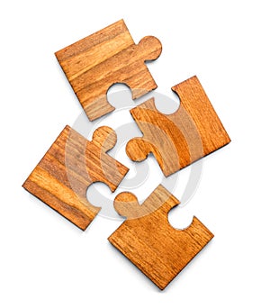 Pieces of wooden puzzle on white background