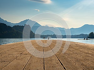 On the pier of Bled Lake in the early morning