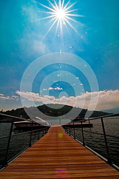 Pier and boat on Lake Maggiore