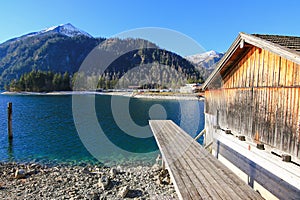 A pier for boat trips on Achensee Lake during winter in Tirol, A