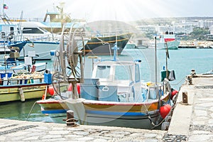 Pier with boats and yachts on the nature of the sea shore