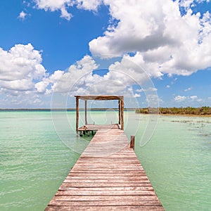 Pier in Caribbean Bacalar lagoon, Quintana Roo, Mexico photo
