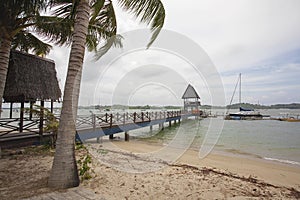 Pier at Changi Point with Sailboats photo