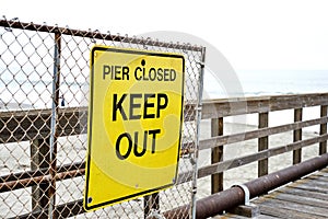 Pier Closed Sign on a Wooden Pier