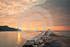 Pier & Cloudy Sunrise