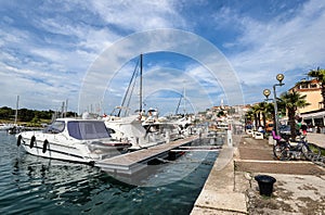 Pier in coastal town of Vrsar, Istria, Croatia. Vrsar - beautiful antique city, yachts and Adriatic Sea