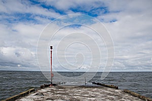 Pier and crashing waves