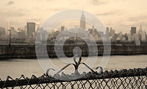 Pier fence with NYC skyline in the background