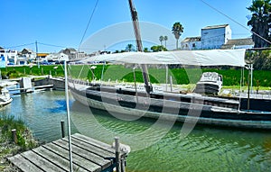 Pier and fishing boats in the lagoon