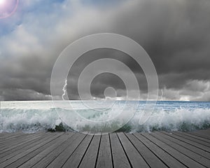 Pier flooded by waves with cludy sky, Lightning dangerous situation