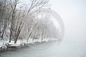 Pier on frozen winter lake