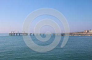 Pier on the island Lido di Venezia, Italy. photo
