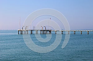 Pier on the island Lido di Venezia, Italy. photo