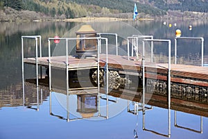 Pier on lake with BBQ at Loch Eck in Dunoon