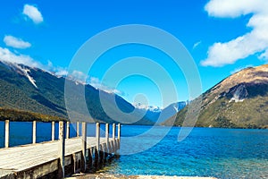 Pier on Lake Rotoiti, Nelson Lakes National Park, New Zealand. Copy space for text
