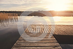 Pier on a lake at sunset, West Pomeranian Voivodeship, Poland