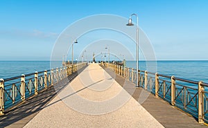 Pier of the Marina di Pietrasanta beach in Versilia, Italy photo