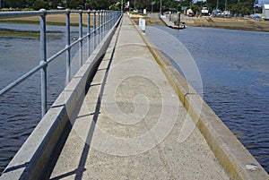 Pier with metal gate on left side