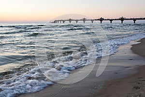 Pier in MiÃâ¢dzyzdroje during the beautiful sunset