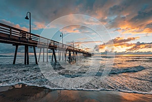 The pier and Pacific Ocean at sunset, in Imperial Beach, near San Diego, California