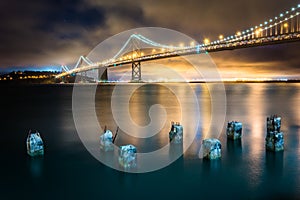 Pier pilings and the San Francisco - Oakland Bay Bridge