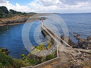 Pier of the port of Grigneau, Britanny region, France photo