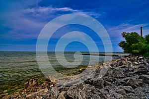 Pier and rocky shore of lake Michigan near sheboygan WI