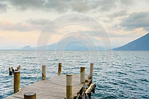 Pier at San Marcos La Laguna with beaufiful scenery of Lake Atitlan and volcanos - Guatemala