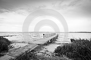 Pier on a Scandinavian beach in black and white