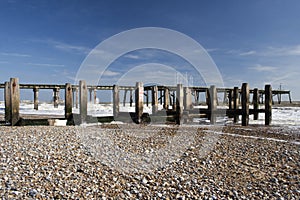 Pier and Sea Defences on Lowestoft Beach, Suffolk, England