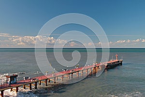 Pier and sea after last night`s storm. Adler, Sochi, Russia