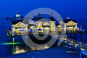 Pier in the seaside resort of Sellin on RÃ¼gen island at Baltic Sea during blue hour in Germany